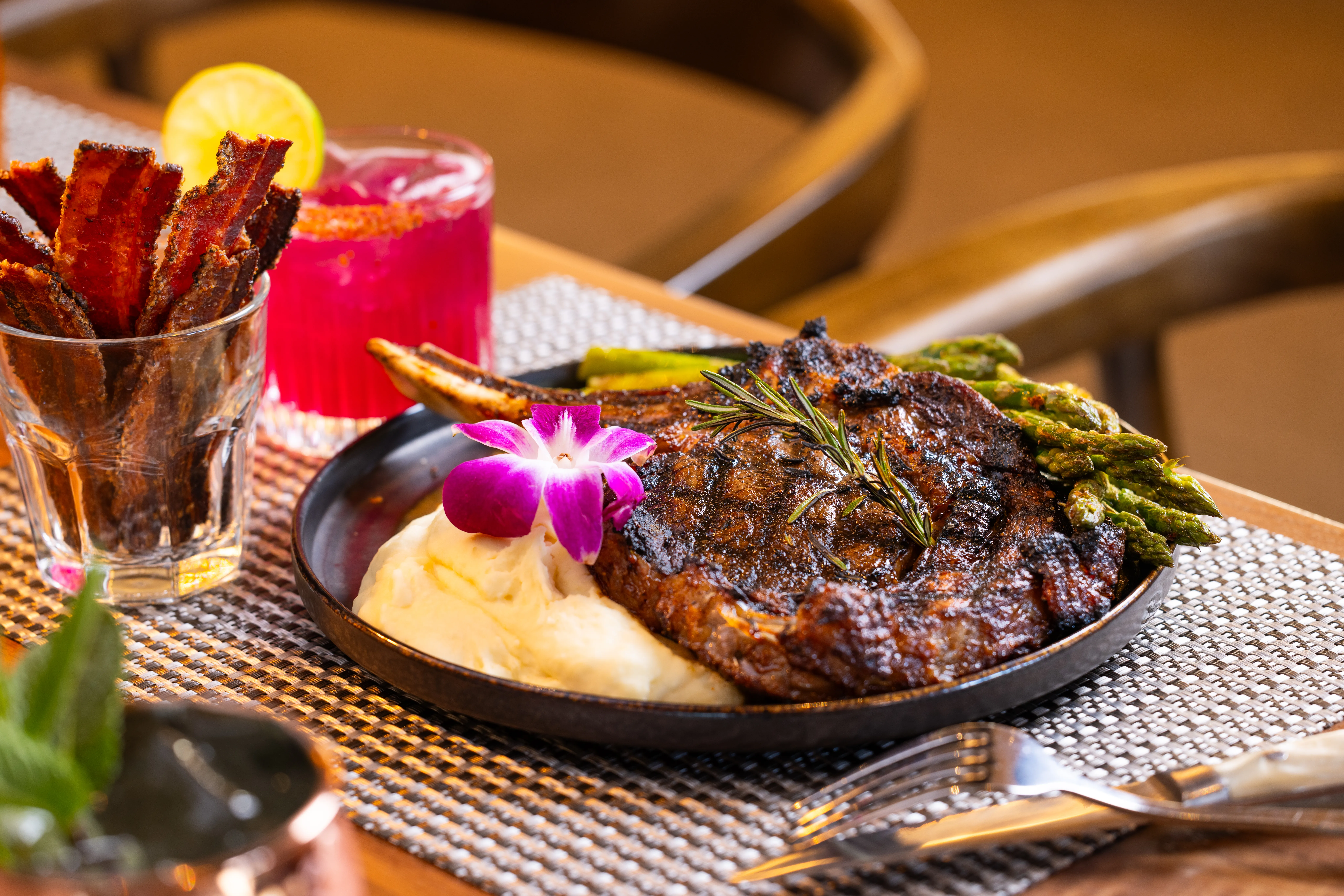 Steak with garnish and sauce.